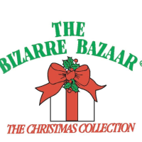 The Bizarre Bazaar Christmas Collection logo, a cartoon image of a square, white gift box, adorned with a red ribbon and red bow, holly leaves and berries
