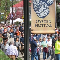 A crowd of people attending the Urbanna Oyster Festival 